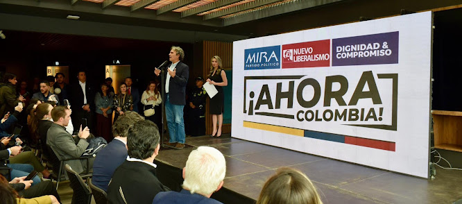 Colombia: Centro político lanza coalición ‘¡Ahora Colombia!’ de cara a elecciones legislativas de 2026 Imagen abstracta con colores vibrantes y formas.